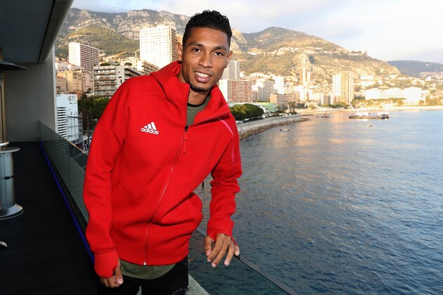 South African sprinter Wayde Van Niekerk poses within the 204th IAAF Council meeting in Monaco on December 2, 2016.   / AFP / VALERY HACHE        (Photo credit should read VALERY HACHE/AFP/Getty Images)