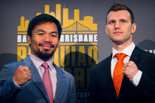 Philippine boxer Manny Pacquiao (L) and Australian challenger Jeff Horn pose after a press conference to promote their upcoming WBO welterweight boxing title fight at Suncorp Stadium in Brisbane on June 28, 2017.
Manny Pacquiao's world title fight with Jeff Horn will be 'short and sweet' with a knockout likely, his trainer predicted on June 28, as his Australian challenger said he was 'ready for war'. / AFP PHOTO / Patrick HAMILTON / -- IMAGE RESTRICTED TO EDITORIAL USE - STRICTLY NO COMMERCIAL USE -- (Photo credit should read PATRICK HAMILTON/AFP/Getty Images) Philippine boxer Manny Pacquiao (L) and Australian challenger Jeff Horn pose after a press conference to promote their upcoming WBO welterweight boxing title fight at Suncorp Stadium in Brisbane on June 28, 2017.
Manny Pacquiao's world title fight with Jeff Horn will be 'short and sweet' with a knockout likely, his trainer predicted on June 28, as his Australian challenger said he was 'ready for war'. / AFP PHOTO / Patrick HAMILTON / -- IMAGE RESTRICTED TO EDITORIAL USE - STRICTLY NO COMMERCIAL USE -- (Photo credit should read PATRICK HAMILTON/AFP/Getty Images)