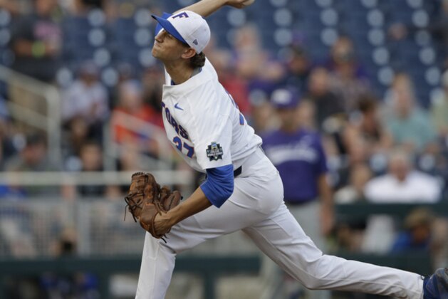 Florida's Jackson Kowar pitches during the first inning of an NCAA College World Series baseball game against TCU in Omaha, Neb., Friday, June 23, 2017. (AP Photo/Nati Harnik)