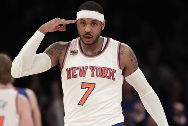 New York Knicks forward Carmelo Anthony (7) reacts after hitting a 3-point shot against the Detroit Pistons during the second quarter of an NBA basketball game, Monday, March 27, 2017, in New York. (AP Photo/Julie Jacobson)