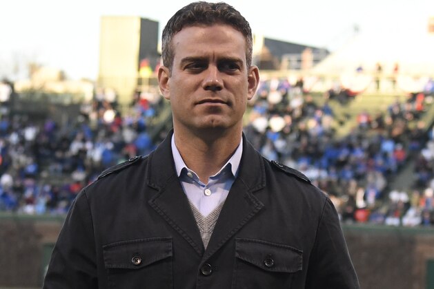 CHICAGO, IL - APRIL 17: Chicago Cubs President Theo Epstein holds a 2016 World Series ring that he will present in a ceremony to former Cubs players before the game against the Milwaukee Brewers on April 17, 2017 at Wrigley Field in Chicago, Illinois. The Brewers won 6-3. (Photo by David Banks/Getty Images) CHICAGO, IL - APRIL 17: Chicago Cubs President Theo Epstein holds a 2016 World Series ring that he will present in a ceremony to former Cubs players before the game against the Milwaukee Brewers on April 17, 2017 at Wrigley Field in Chicago, Illinois. The Brewers won 6-3. (Photo by David Banks/Getty Images)