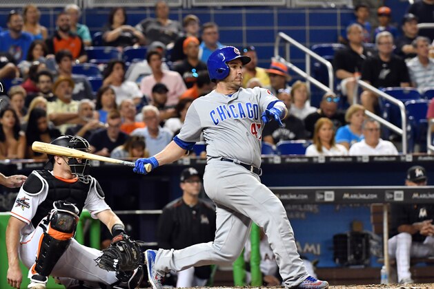 Jun 23, 2017; Miami, FL, USA; Chicago Cubs catcher Miguel Montero (47) connects for a base hit in the sixth inning against the Miami Marlins at Marlins Park. Mandatory Credit: Steve Mitchell-USA TODAY Sports