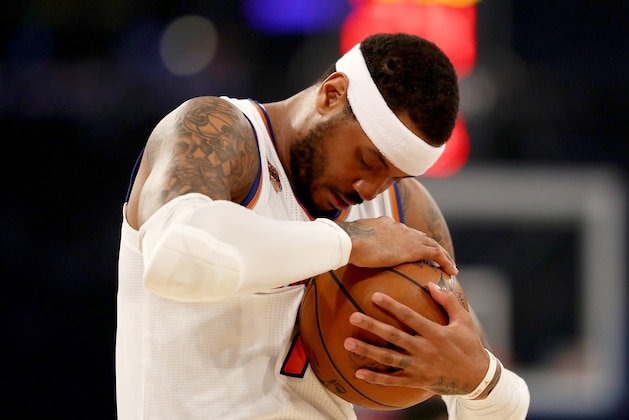 NEW YORK, NY - APRIL 12:  Carmelo Anthony #7 of the New York Knicks hugs the ball before the opening tipoff against the Philadelphia 76ers at Madison Square Garden on April 12, 2017 in New York City. NOTE TO USER: User expressly acknowledges and agrees that, by downloading and or using this Photograph, user is consenting to the terms and conditions of the Getty Images License Agreement  (Photo by Elsa/Getty Images)