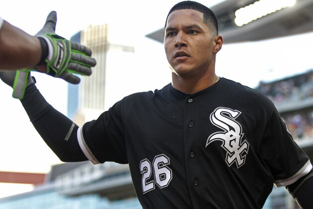 Chicago White Sox designated hitter Avisail Garcia is congratulated for his two-run home run against the Minnesota Twins during the third inning of a baseball game Tuesday, June 20, 2017, in Minneapolis. (AP Photo/Bruce Kluckhohn)
