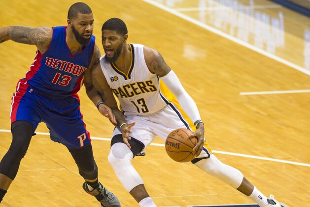 Indiana Pacers forward Paul George (13) works the ball along the baseline against Detroit Pistons forward Marcus Morris (13) during the second half of an NBA basketball game in Indianapolis, Wednesday, March 8, 2017. The Indiana Pacers won 115-98. (AP Photo/Doug McSchooler)
