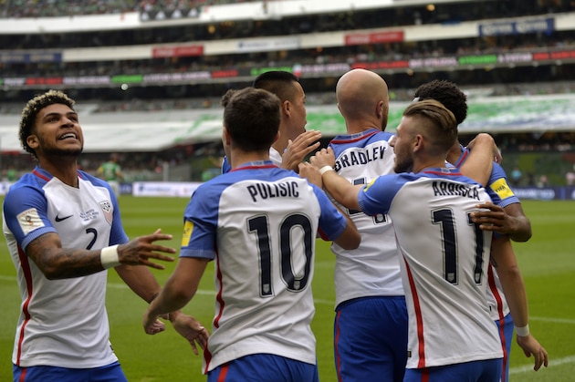 US midfielder Michael Bradley (3-R) celebrates with teammates after scoring against Mexico during their 2018 World Cup Concacaf qualifier football match, in Mexico City, on June 11, 2017. / AFP PHOTO / Pedro PARDO        (Photo credit should read PEDRO PARDO/AFP/Getty Images)