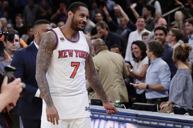New York Knicks' Carmelo Anthony (7) leaves the court after an NBA basketball game against the Philadelphia 76ers Wednesday, April 12, 2017, in New York. The Knicks won 114-113. (AP Photo/Frank Franklin II)