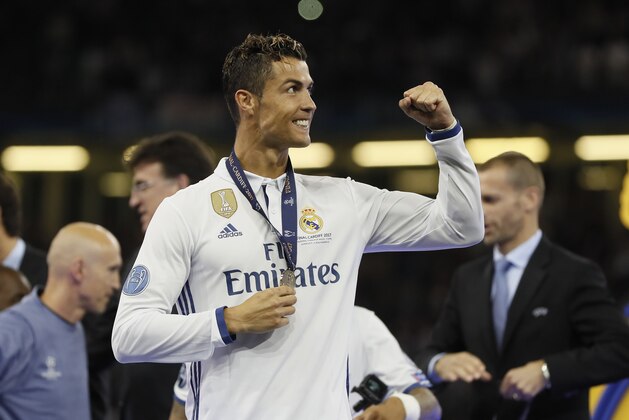 Real Madrid's Cristiano Ronaldo celebrates at the end of the Champions League soccer final between Juventus and Real Madrid at the Millennium Stadium in Cardiff, Wales, Saturday, June 3, 2017. (AP Photo/Kirsty Wigglesworth)