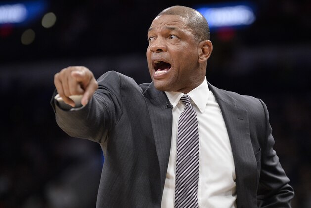 Los Angeles Clippers head coach Doc Rivers yells to his players during the first half of an NBA basketball game against the San Antonio Spurs, Saturday, April 8, 2017, in San Antonio. (AP Photo/Darren Abate)