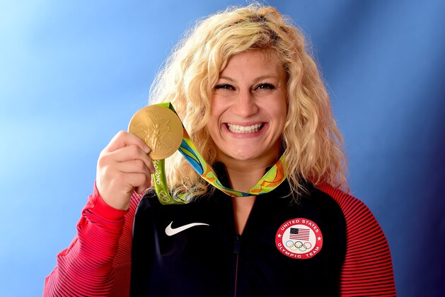 RIO DE JANEIRO, BRAZIL - AUGUST 12:  (BROADCAST - OUT) Judoka Kayla Harrison of the United States poses for a photo with her gold medal on the Today show set on Copacabana Beach on August 12, 2016 in Rio de Janeiro, Brazil.  (Photo by Harry How/Getty Images)