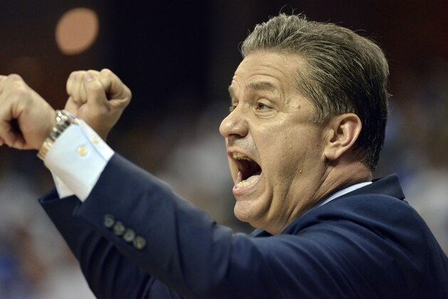 Kentucky head coach John Calipari directs his team in the first half of the South Regional final game against North Carolina in the NCAA college basketball tournament Sunday, March 26, 2017, in Memphis, Tenn. (AP Photo/Brandon Dill)