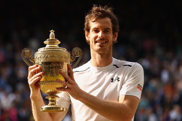 LONDON, ENGLAND - JULY 10:  Andy Murray of Great Britain lifts the trophy following victory in the Men's Singles Final against Milos Raonic of Canada on day thirteen of the Wimbledon Lawn Tennis Championships at the All England Lawn Tennis and Croquet Club on July 10, 2016 in London, England.  (Photo by Julian Finney/Getty Images)