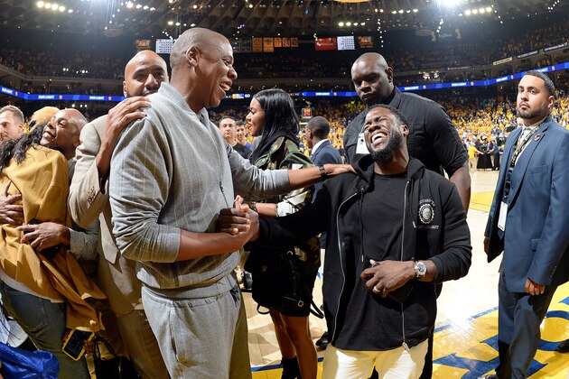 OAKLAND, CA - JUNE 1: Jay-Z and Kevin Hart are seen at the game between the Golden State Warriors and the Cleveland Cavaliers during Game One of the 2017 NBA Finals at Oracle Arena on June 1, 2017 in Oakland, California. NOTE TO USER: User expressly acknowledges and agrees that, by downloading and/or using this Photograph, user is consenting to the terms and conditions of the Getty Images License Agreement. Mandatory Copyright Notice: Copyright 2017 NBAE (Photo by Andrew D. Bernstein/NBAE via Getty Images)