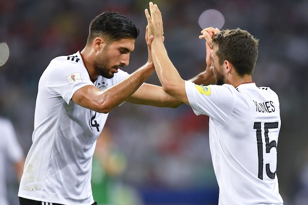 Germany's Amin Younes, right, celebrates with teammate Emre Can after scoring his side's fourth goal during the Confederations Cup, semifinal soccer match between Germany and Mexico, at the Fisht Stadium in Sochi, Russia, Thursday, June 29, 2017. (AP Photo/Martin Meissner)