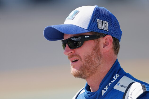 DAYTONA BEACH, FL - JUNE 30:  Dale Earnhardt Jr., driver of the #88 Nationwide Chevrolet, stands on the grid during qualifying for the Monster Energy NASCAR Cup Series 59th Annual Coke Zero 400 Powered By Coca-Cola at Daytona International Speedway on June 30, 2017 in Daytona Beach, Florida.  (Photo by Brian Lawdermilk/Getty Images)