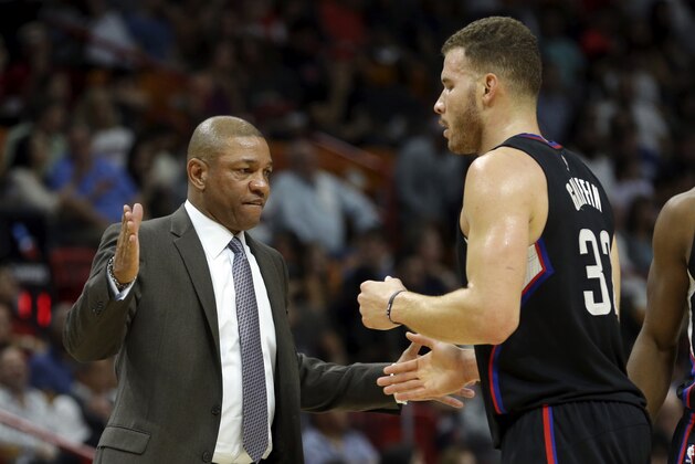 LA Clippers head coach Doc Rivers, left, greets forward Blake Griffin (32) during the first half of an NBA basketball game against the Miami Heat, Friday, Dec. 16, 2016, in Miami. (AP Photo/Lynne Sladky) LA Clippers head coach Doc Rivers, left, greets forward Blake Griffin (32) during the first half of an NBA basketball game against the Miami Heat, Friday, Dec. 16, 2016, in Miami. (AP Photo/Lynne Sladky)