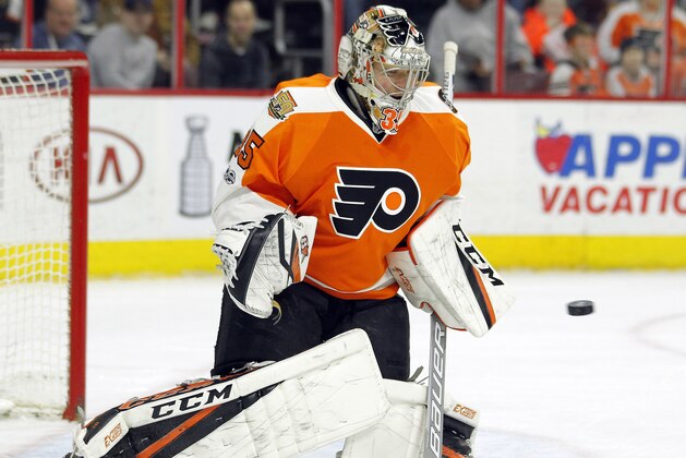 Philadelphia Flyers' Steve Mason tracks the incoming puck during the first period of an NHL hockey game against the Columbus Blue Jackets, Saturday, April 8, 2017, in Philadelphia. (AP Photo/Tom Mihalek)