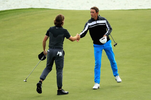 PARIS, FRANCE - JULY 01:  Alexander Bjork of Sweden shakes hands with Tommy Fleetwood of England as they finish their round on the 18th green during day three of the HNA Open de France at Le Golf National on July 1, 2017 in Paris, France.  (Photo by Andrew Redington/Getty Images)