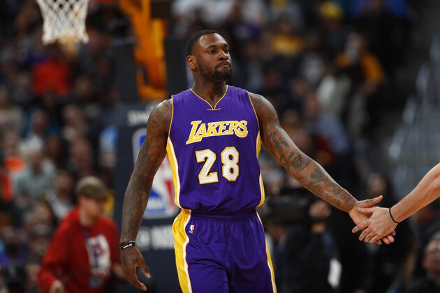 Los Angeles Lakers center Tarik Black (28) in the second half of an NBA basketball game Monday, March 13, 2017, in Denver. The Nuggets won 129-101. (AP Photo/David Zalubowski)