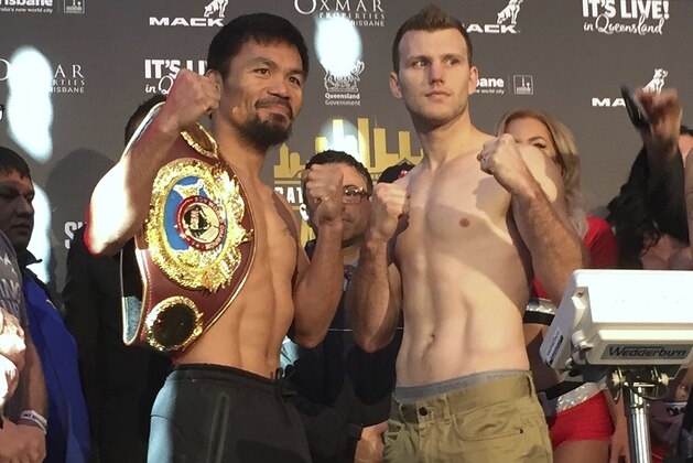 Manny Pacquiao, left, and Jeff Horn pose for a photo after weighing in, Tuesday, July 1, 2017, in Brisbane, Australia. Pacquiao, is putting his WBO welterweight world title on the line Sunday, July 2, against the 29-year-old Horn. (AP Photo/John Pye) Manny Pacquiao, left, and Jeff Horn pose for a photo after weighing in, Tuesday, July 1, 2017, in Brisbane, Australia. Pacquiao, is putting his WBO welterweight world title on the line Sunday, July 2, against the 29-year-old Horn. (AP Photo/John Pye)