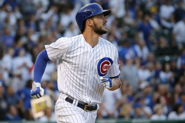 Chicago Cubs' Kris Bryant watches his home run off Colorado Rockies starting pitcher Tyler Chatwood during the first inning of a baseball game Thursday, June 8, 2017, in Chicago. (AP Photo/Charles Rex Arbogast)