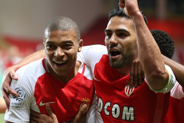 MONACO, MONACO - MAY 17: Kylian Mbappe of Monaco celebrates his goal with Radamel Falcao during the French Ligue 1 match between AS Monaco and AS Saint-Etienne (ASSE) at Stade Louis II on May 17, 2017 in Monaco, Monaco. (Photo by Jean Catuffe/Getty Images)