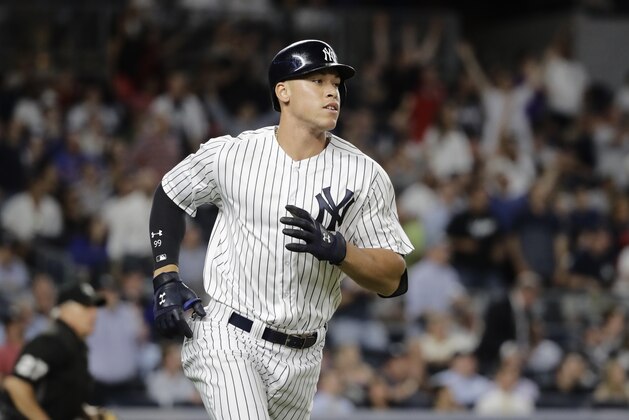 FILE - In this June 20, 2017, file photo, New York Yankees' Aaron Judge runs the bases after hitting a home run against the Los Angeles Angels in a baseball game in New York. Time to make the tough calls on which players warrant selection to the upcoming All-Star Game in Miami. Rest assured, rookie sensation Judge and perennial slugger Bryce Harper have secured their spots. (AP Photo/Frank Franklin II, File)