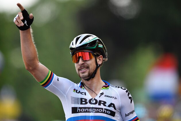 Slovakia's Peter Sagan celebrates as he crosses the finish line at the end of the 212,5 km third stage of the 104th edition of the Tour de France cycling race on July 3, 2017 between Verviers, Belgium and Longwy, France. / AFP PHOTO / Jeff PACHOUD        (Photo credit should read JEFF PACHOUD/AFP/Getty Images)