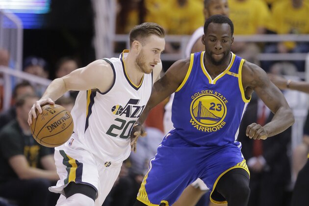 Utah Jazz forward Gordon Hayward (20) drives as Golden State Warriors forward Draymond Green (23) defends in the first half during Game 4 of the NBA basketball second-round playoff series, Monday, May 8, 2017, in Salt Lake City. (AP Photo/Rick Bowmer)