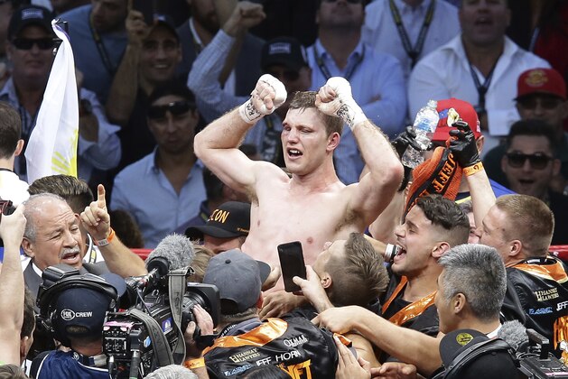 Jeff Horn of Australia celebrates after beating Manny Pacquiao of the Philippines during their WBO World welterweight title fight in Brisbane, Australia, Sunday, July 2, 2017. (AP Photo/Tertius Pickard)