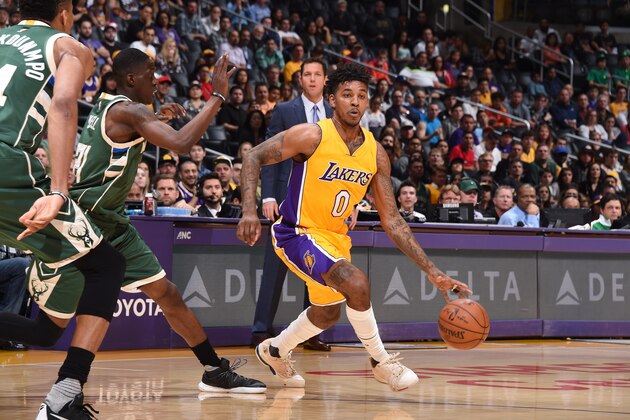LOS ANGELES, CA - MARCH 17: Nick Young #0 of the Los Angeles Lakers handles the ball against the Milwaukee Bucks on March 17, 2017 at STAPLES Center in Los Angeles, California. NOTE TO USER: User expressly acknowledges and agrees that, by downloading and/or using this Photograph, user is consenting to the terms and conditions of the Getty Images License Agreement. Mandatory Copyright Notice: Copyright 2017 NBAE (Photo by Andrew D. Bernstein/NBAE via Getty Images)