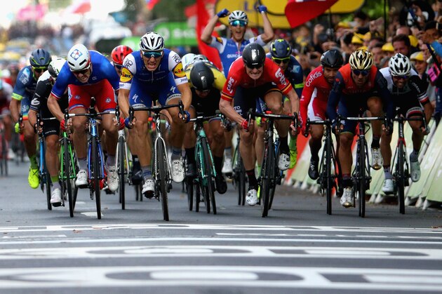 LIEGE, BELGIUM - JULY 02: The race for the line between Marcel Kittel of Germany and Quick-Step Floors, Arnaud Demare of France and FDJ, Andre Greipel of Germany and Lotto Soudal and Mark Cavendish of Great Britain and Team Dimension Data during stage two of the 2017 Tour de France, a 203.5km road stage from Dusseldorf to Liege on July 2, 2017 in Liege, Belgium. (Photo by Chris Graythen/Getty Images) LIEGE, BELGIUM - JULY 02: The race for the line between Marcel Kittel of Germany and Quick-Step Floors, Arnaud Demare of France and FDJ, Andre Greipel of Germany and Lotto Soudal and Mark Cavendish of Great Britain and Team Dimension Data during stage two of the 2017 Tour de France, a 203.5km road stage from Dusseldorf to Liege on July 2, 2017 in Liege, Belgium. (Photo by Chris Graythen/Getty Images)