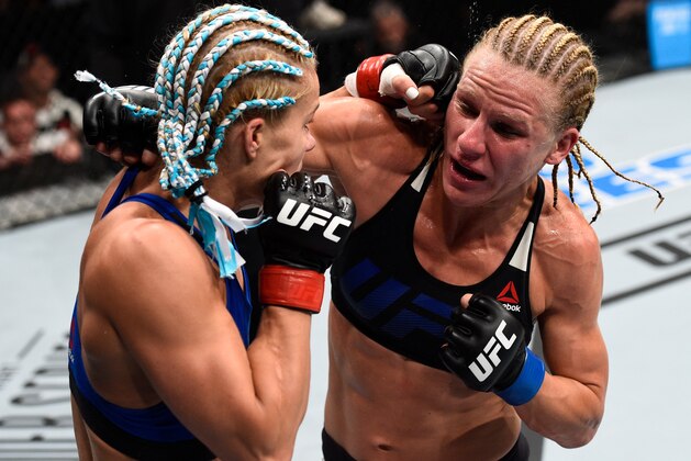 OKLAHOMA CITY, OK - JUNE 25:   (L-R) Felice Herrig punches Justine Kish in their women's strawweight bout during the UFC Fight Night event at the Chesapeake Energy Arena on June 25, 2017 in Oklahoma City, Oklahoma. (Photo by Brandon Magnus/Zuffa LLC/Zuffa LLC via Getty Images)