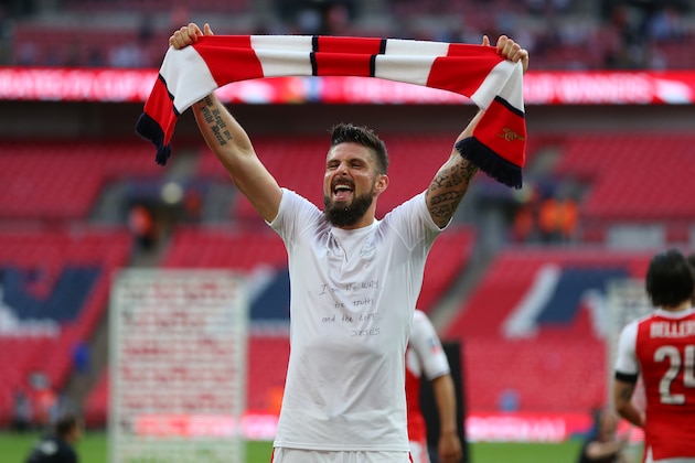 LONDON, ENGLAND - MAY 27: Olivier Giroud of Arsenal with religious message on his shirt holds a scarf during the Emirates FA Cup Final match between Arsenal and Chelsea at Wembley Stadium on May 27, 2017 in London, England. (Photo by Catherine Ivill - AMA/Getty Images) LONDON, ENGLAND - MAY 27: Olivier Giroud of Arsenal with religious message on his shirt holds a scarf during the Emirates FA Cup Final match between Arsenal and Chelsea at Wembley Stadium on May 27, 2017 in London, England. (Photo by Catherine Ivill - AMA/Getty Images)