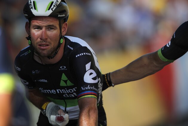 Britain's Mark Cavendish crosses the finish line after he crashed during the sprint of the fourth stage of the Tour de France cycling race over 207.5 kilometers (129 miles) with start in Mondorf-les-Bains, Luxembourg, and finish in Vittel, France, , Tuesday, July 4, 2017. (AP Photo/Christophe Ena)
