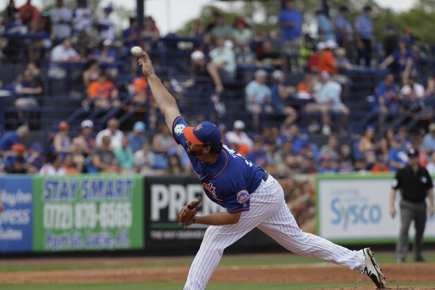 New York Mets pitcher Logan Taylor throws against the Washington Nationals during a spring training baseball game Saturday, Feb. 25, 2017, in Port St. Lucie, Fla. (AP Photo/David J. Phillip)