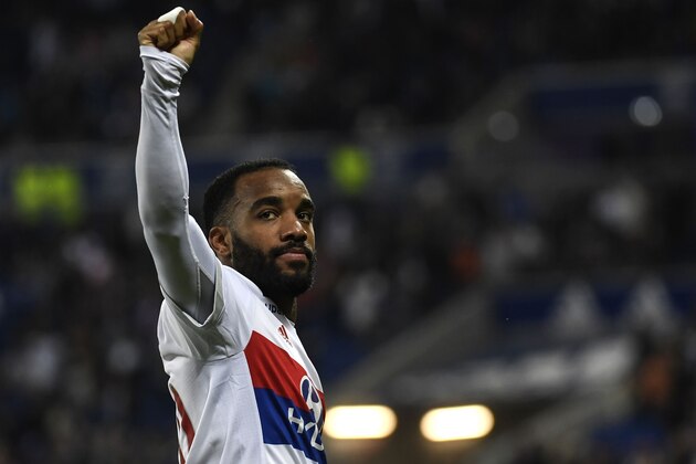 Lyon's French forward Alexandre Lacazette reacts after scoring a goal during the French L1 football match between Lyon (OL) and Nice (OGCN) on May 20, 2017, at the Parc Olympique Lyonnais stadium in Decines-Charpieu near Lyon, central-eastern  France. / AFP PHOTO / PHILIPPE DESMAZES        (Photo credit should read PHILIPPE DESMAZES/AFP/Getty Images)