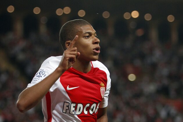Monaco's forward Kylian MBappe Lottin celebrates his opening goal during the League One soccer match Monaco against Saint Etienne, at the Louis II stadium in Monaco, Wednesday, May 17, 2017. (AP Photo/Claude Paris)