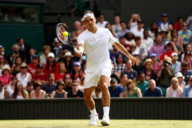LONDON, ENGLAND - JULY 04:  Roger Federer of Switzerland plays a forehand during the Gentlemen's Singles first round match against Alexandr Dolgopolov of Ukraine on day two of the Wimbledon Lawn Tennis Championships at the All England Lawn Tennis and Croquet Club on July 4, 2017 in London, England.  (Photo by Michael Steele/Getty Images)
