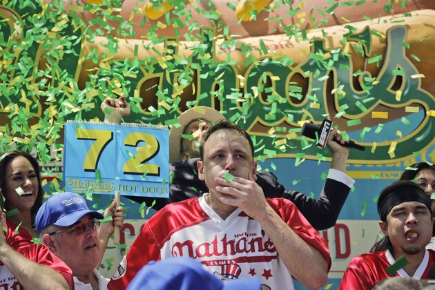 Joey Chestnut wins the Nathan's Famous Hot Dog Eating Contest, marking his 10th victory in the event, Tuesday, July 4, 2017, in the Brooklyn borough of New York. He downed 72 hot dogs and buns in 10 minutes. (AP Photo/Bebeto Matthews)