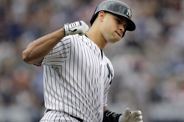 New York Yankees' Gary Sanchez reacts after hitting a three-run home run during the fifth inning of the baseball game against the Texas Rangers at Yankee Stadium, Sunday, June 25, 2017, in New York. (AP Photo/Seth Wenig)