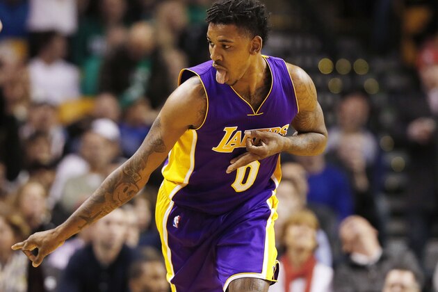 Los Angeles Lakers guard Nick Young celebrates a three pointer against the Boston Celtics during the second quarter of an NBA basketball game in Boston Friday, Feb. 3, 2017. (AP Photo/Winslow Townson)