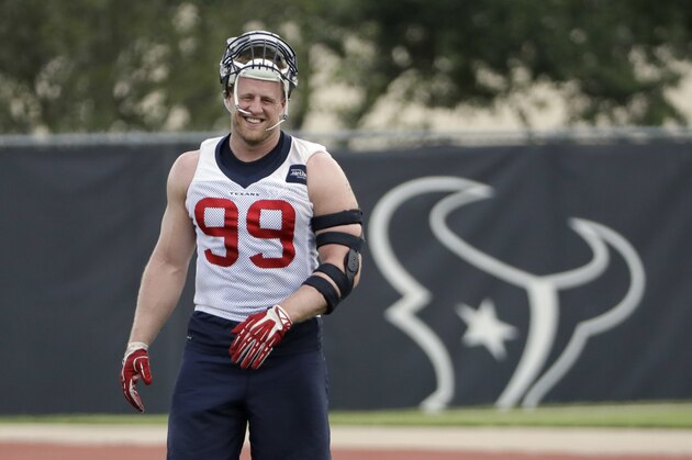 Houston Texans defensive end J.J. Watt (99) stretches during an NFL organized team activities football practice Tuesday, June 6, 2017, in Houston. (AP Photo/David J. Phillip)