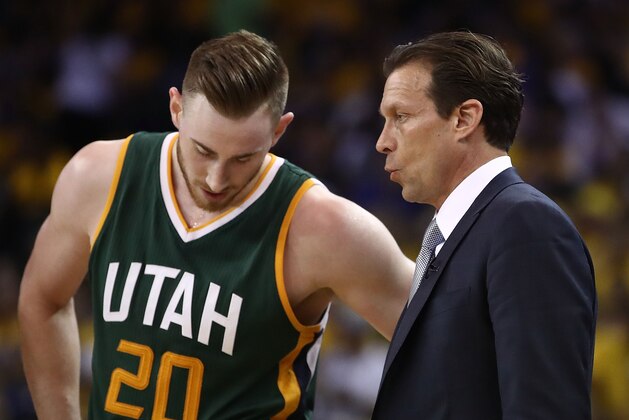 OAKLAND, CA - MAY 02:  Quin Snyder of the Utah Jazz converses with Gordon Hayward #20 against the Golden State Warriors during Game One of the NBA Western Conference Semi-Finals at ORACLE Arena on May 2, 2017 in Oakland, California.  NOTE TO USER: User expressly acknowledges and agrees that, by downloading and or using this photograph, User is consenting to the terms and conditions of the Getty Images License Agreement.  (Photo by Ezra Shaw/Getty Images)