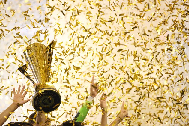 PHILADELPHIA, PA  - JULY 26:  Andres Guardado #18 of Mexico lifts The CONCACAF Gold Cup Trophy after the 2015 CONCACAF Gold Cup Final match between Jamaica and Mexico at Lincoln Financial Field on July 26, 2015 in Philadelphia,Pennsylvania.  (Photo by Matthew Ashton - AMA/Getty Images)