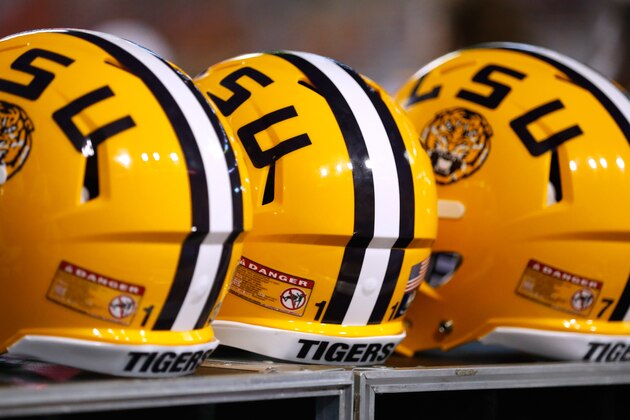 The LSU logo is seen on a helmet during the first half of an NCAA college football game in Baton Rouge, La., Saturday, September 6, 2014. (AP Photo/Jonathan Bachman)