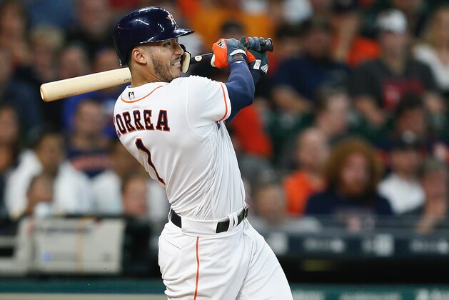 HOUSTON, TX - JUNE 29:  Carlos Correa #1 of the Houston Astros hits a two-run home run in the sixth inning against the Oakland Athletics at Minute Maid Park on June 29, 2017 in Houston, Texas.  (Photo by Bob Levey/Getty Images)