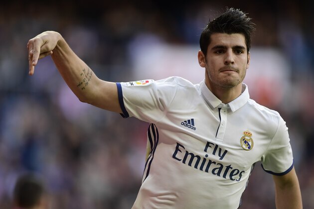 Real Madrid's forward Alvaro Morata celebrates after scoring a goal  during the Spanish league football match Real Madrid CF vs Club Deportivo Leganes SAD at the Santiago Bernabeu stadium in Madrid  on November 6, 2016. / AFP / JAVIER SORIANO        (Photo credit should read JAVIER SORIANO/AFP/Getty Images)
