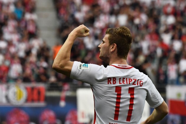 Leipzig's forward Timo Werner celebrates after scoring during the Bundesliga match RB Leipzig vs Bayern Munich in Leipzig on May 13, 2017. Bayern came from behind to win 5 to 4 in the dying minutes of the match. / AFP PHOTO / John MACDOUGALL / RESTRICTIONS: DURING MATCH TIME: DFL RULES TO LIMIT THE ONLINE USAGE TO 15 PICTURES PER MATCH AND FORBID IMAGE SEQUENCES TO SIMULATE VIDEO. == RESTRICTED TO EDITORIAL USE == FOR FURTHER QUERIES PLEASE CONTACT DFL DIRECTLY AT + 49 69 650050
        (Photo credit should read JOHN MACDOUGALL/AFP/Getty Images)