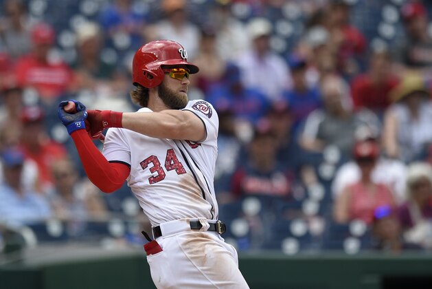 Washington Nationals' Bryce Harper bats during a baseball game against the New York Mets, Tuesday, July 4, 2017, in Washington. The Nationals won 11-4. (AP Photo/Nick Wass)